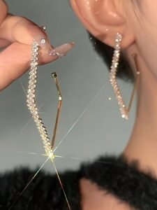 A Pair Of European And American Fashion Dazzling -Shaped Ring Earrings.